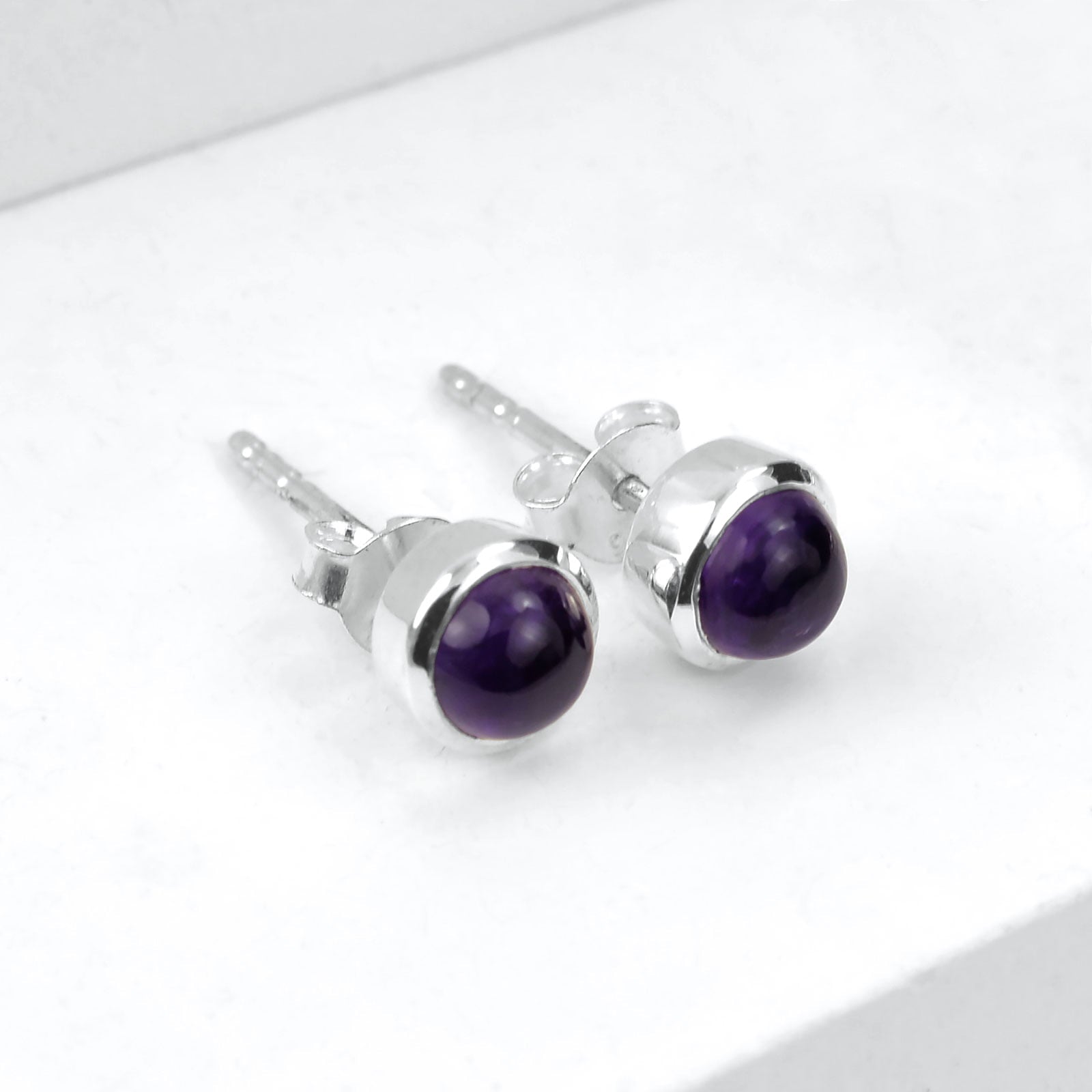 February birthstone earring studs with amethyst in sterling silver