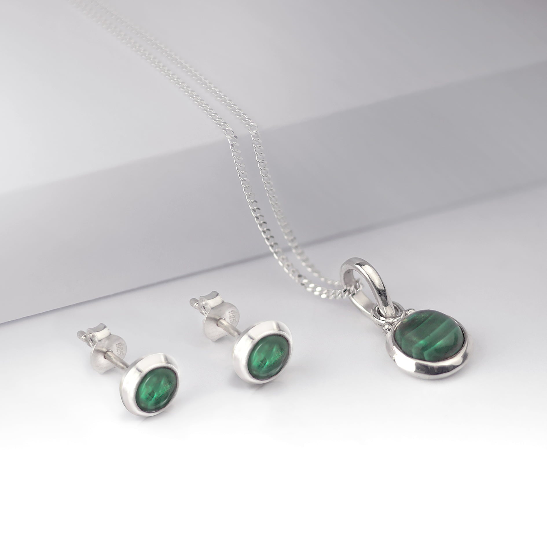 round malachite jewellery set in sterling silver