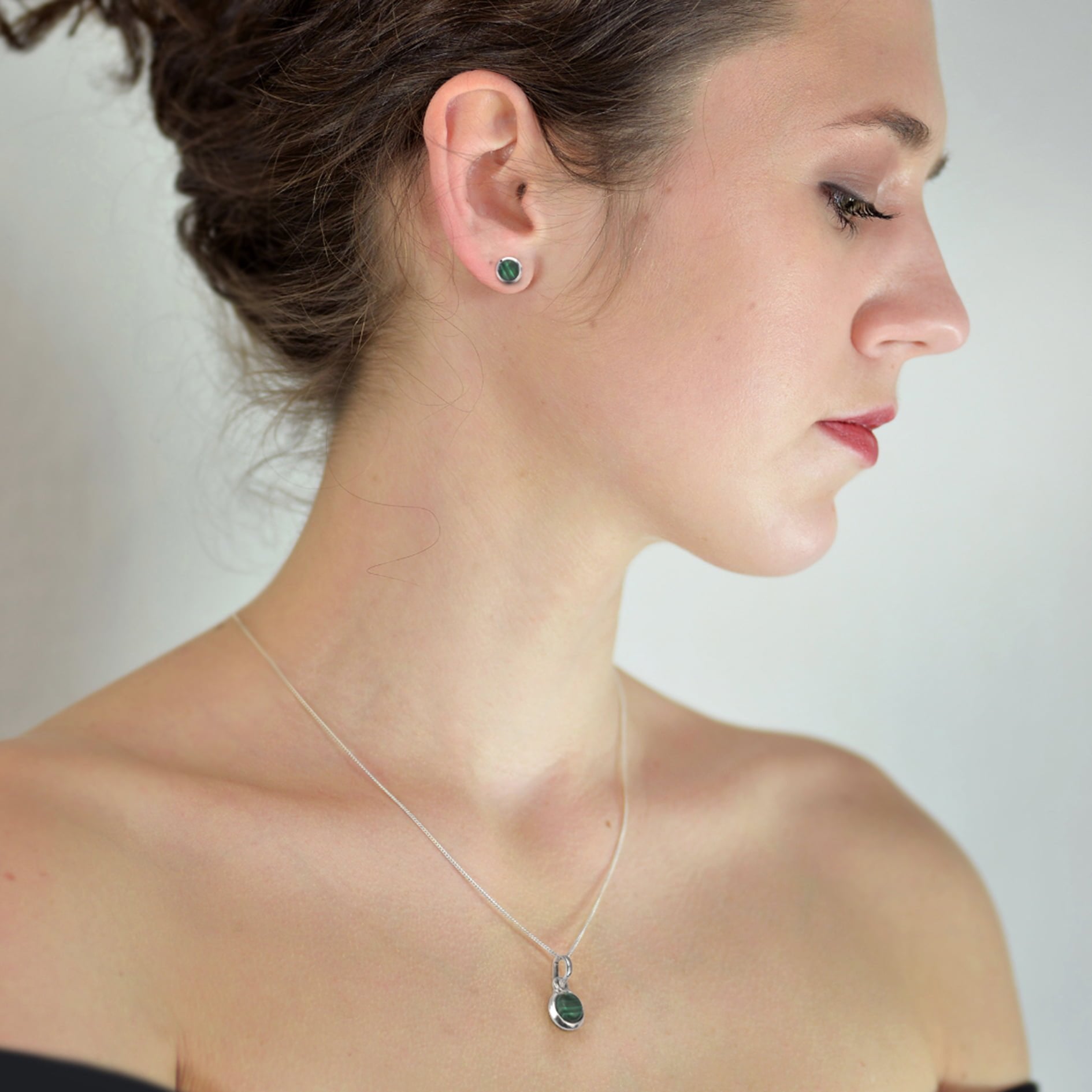 round malachite jewellery set in sterling silver on model