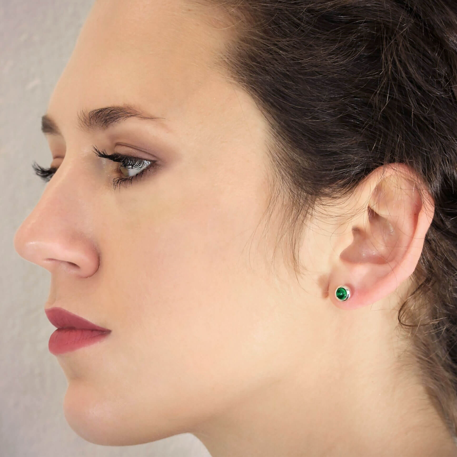 May Birthstone Earrings with Emerald, on model
