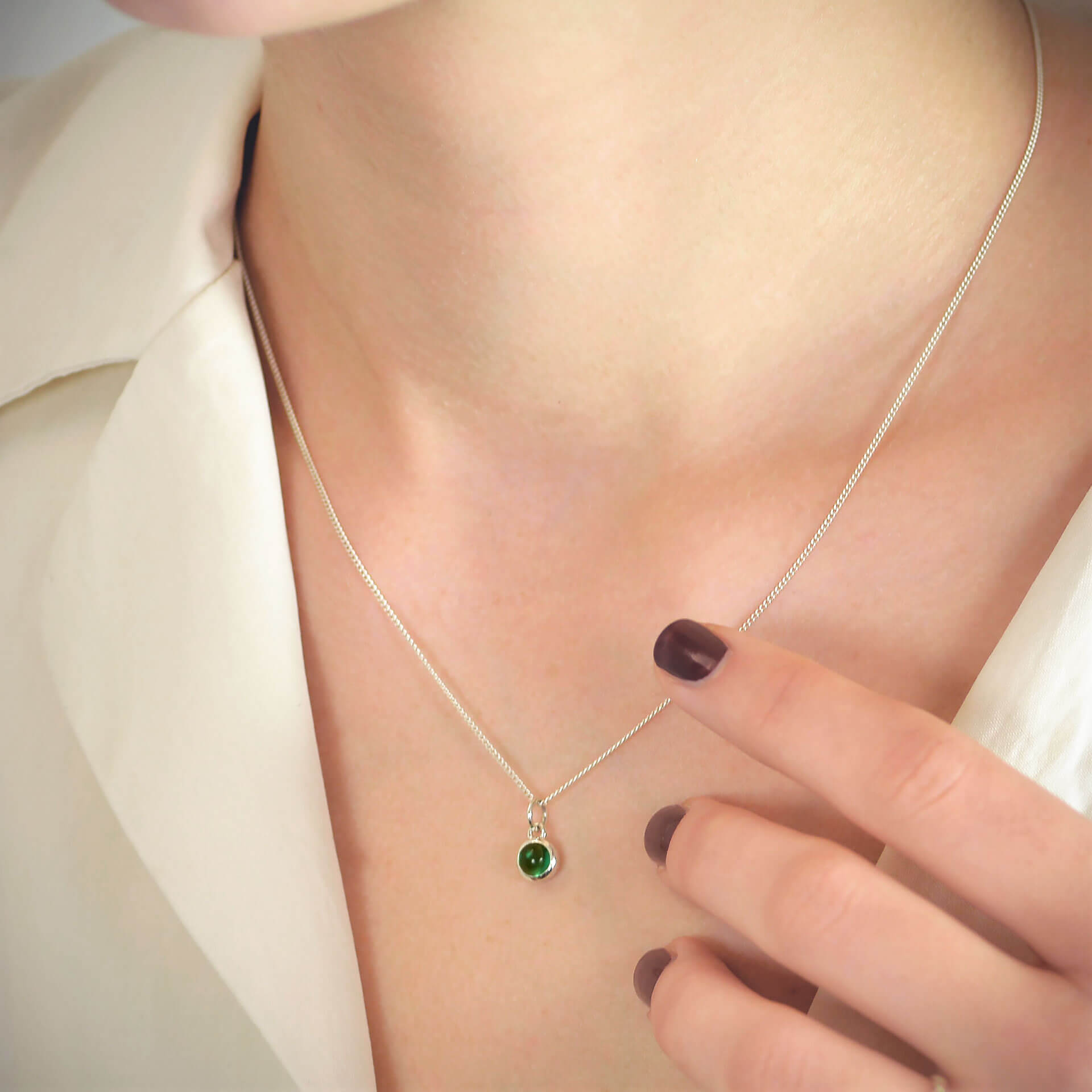 May Birthstone Necklace with Emerald and Silver on model