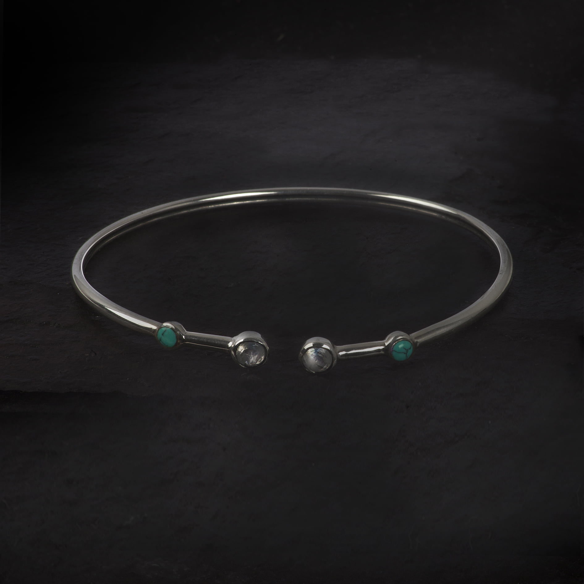 silver bangle with moonstone and turquoise gemstones
