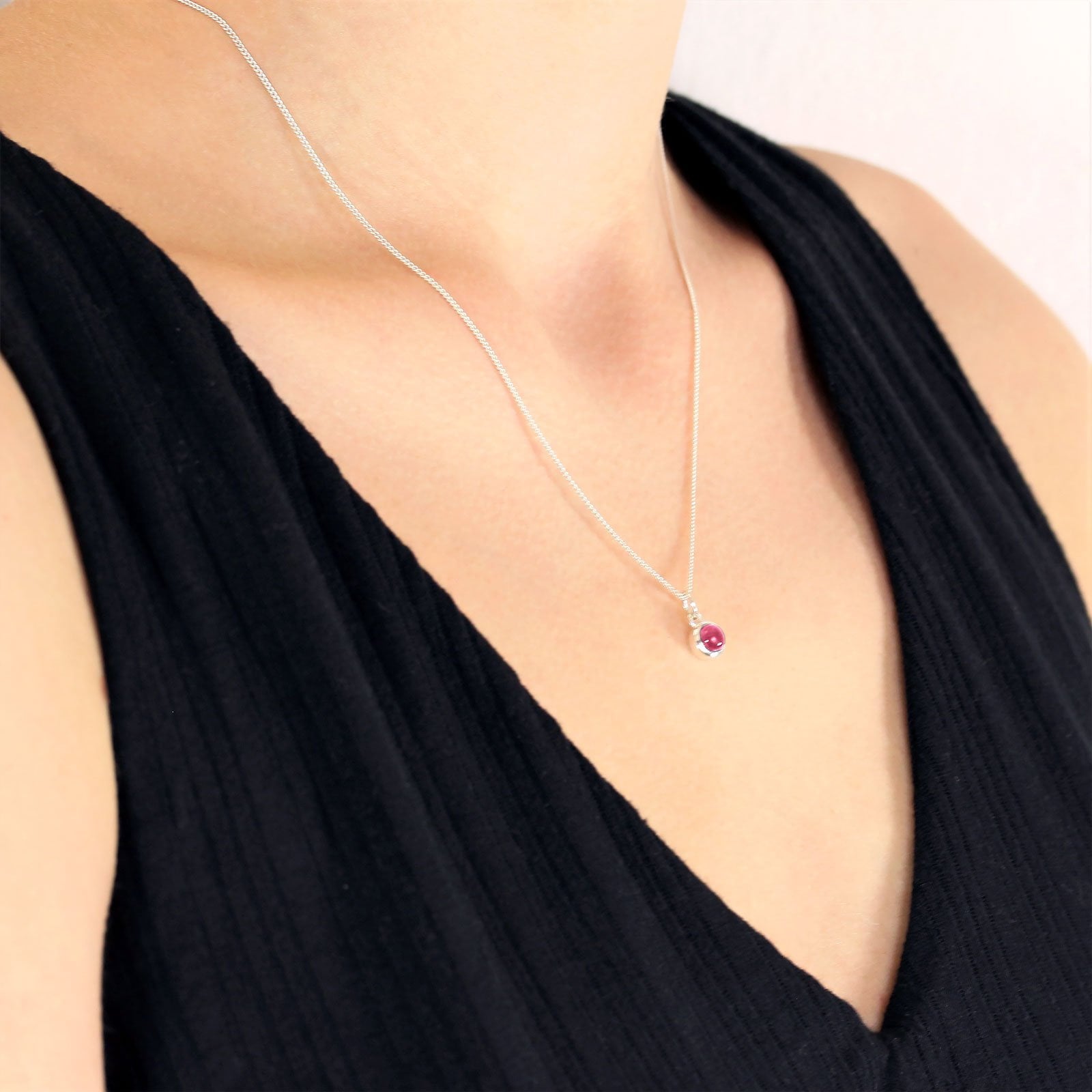 october birthstone necklace with pink tourmaline pendant in silver