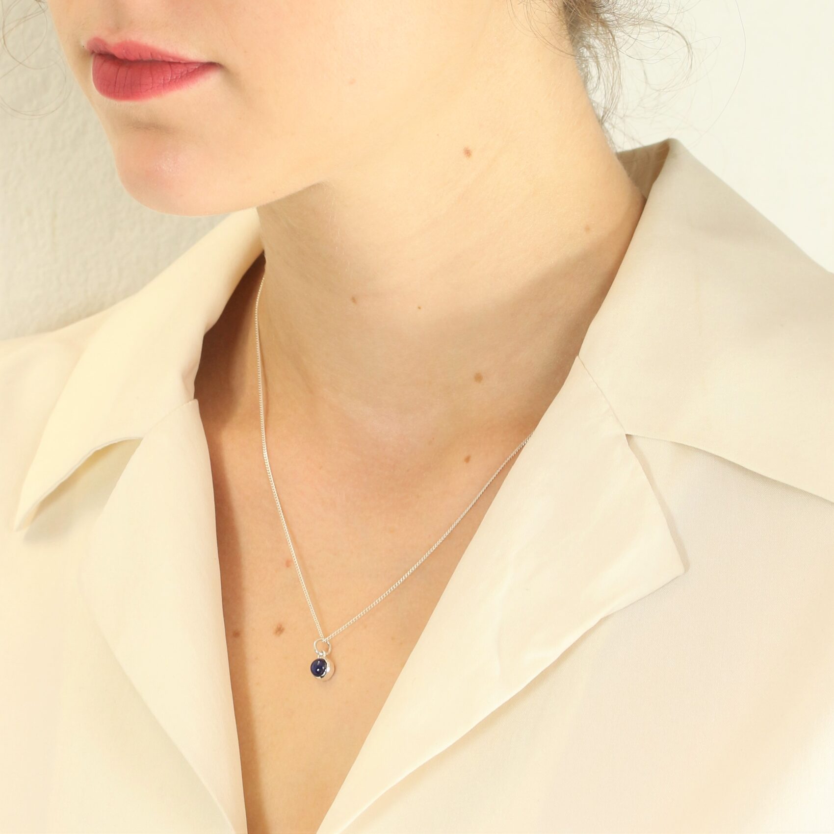 september birthstone necklace with blue sapphire pendant in sterling silver